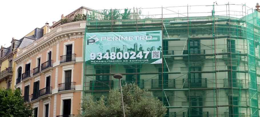 IDG GRUP WEB - IMAGEN CORPORATIVA Y PUBLICIDAD. ROTULACIÓN. Diseñamos LONAS, BANDEROLAS, PANCARTAS para las obras de empresas de construcción y rehabilitación de edificios. Frontlit, microperforadas con rejilla pvc, solvotex,... LONA GRAN FORMATO Cliente: REHABILITACIONES PERIMETRO 5